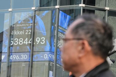 asian-shares-us-futures-gain-as-japan-keeps-its-key-interest-rate-unchanged.jpg