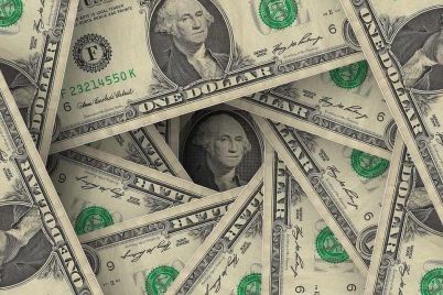 dollar-slightly-lower-on-fed-rate-cut-expectations.jpg
