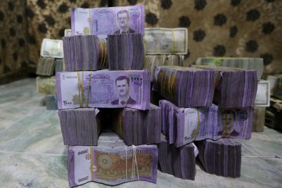 exclusive-syria-to-revalue-currency-dropping-two-zeros-in-bid-for-stability-sources-say.jpg