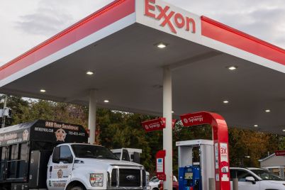 exxon-earnings-fall-on-lower-oil-prices-as-opec-raises-production-scaled.jpg