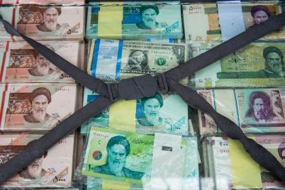 iran-faces-dual-crisis-amid-currency-drop-and-loss-of-major-regional-ally.jpg